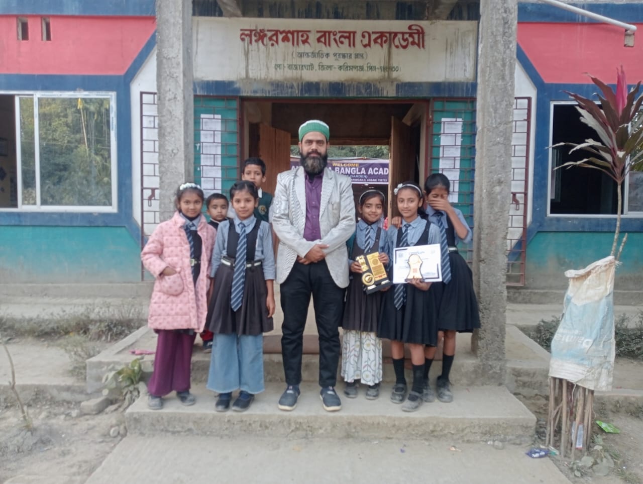 Students with Trophy